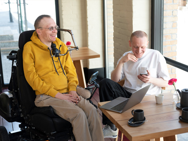 Two people having a discussion on a public coffee